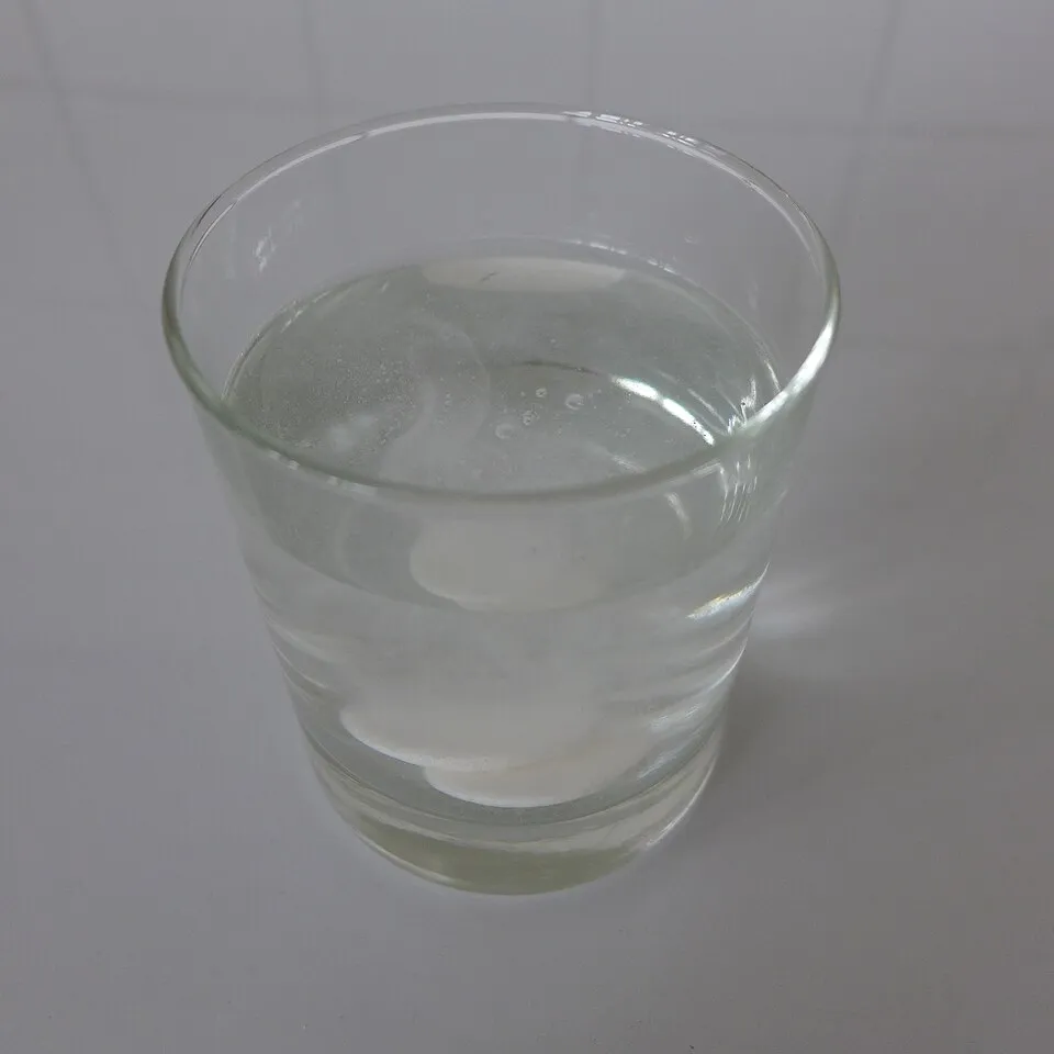 An effervescent tablet fizzing in water